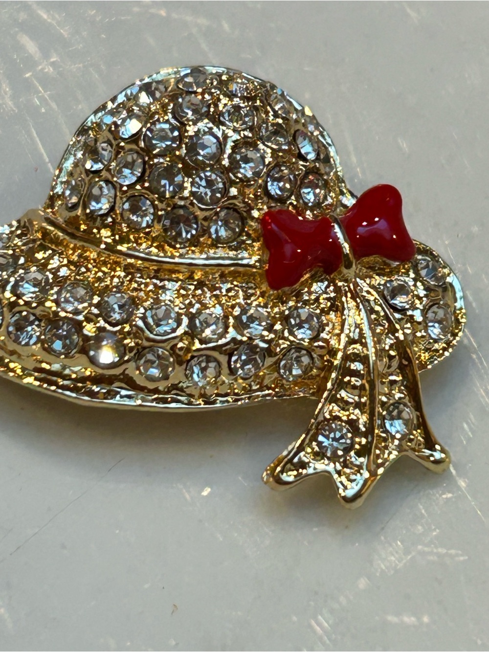 Gold Crystal Straw Hat Brooch with Red Enamel Bow
